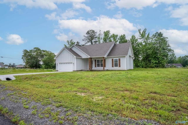 55 Edgewood St, Rainsville, AL 35986 - ranch-style home featuring an attached garage, a front yard, board and batten siding, and driveway