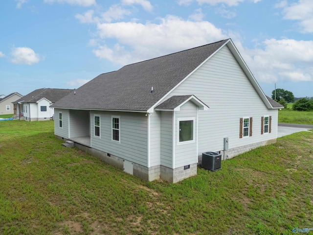 55 Edgewood St, Rainsville, AL 35986 - back of property with crawl space, roof with shingles, central AC, and a yard