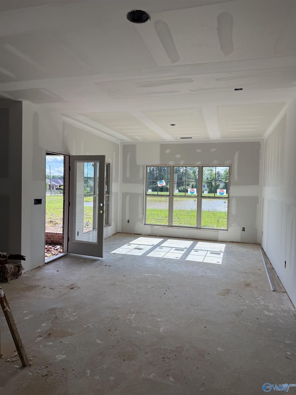 7008 High Park Trce, Gurley, AL 35748 - unfurnished living room with plenty of natural light
