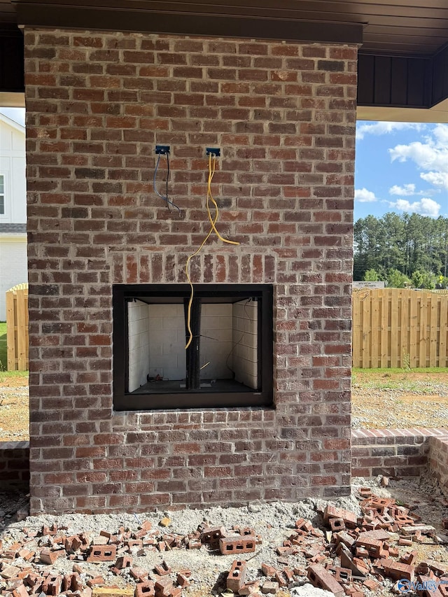 7008 High Park Trce, Gurley, AL 35748 - exterior view of brick siding and an outdoor brick fireplace