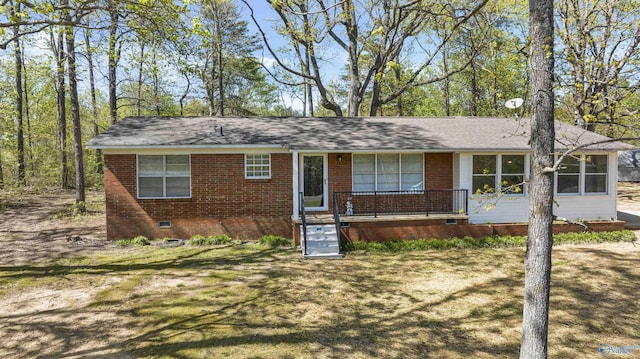 ranch-style house with brick siding, crawl space, and a front yard