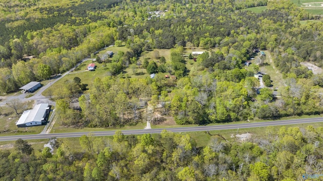 aerial view with a wooded view