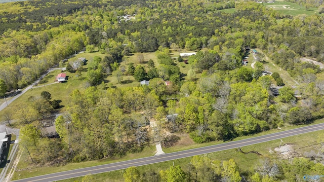 aerial view featuring a view of trees