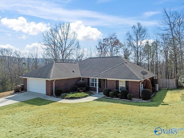 ranch-style home with a garage and a front lawn