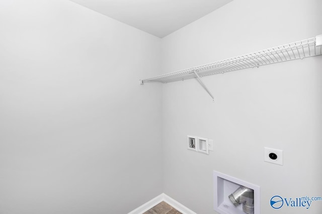 laundry area with washer hookup and electric dryer hookup