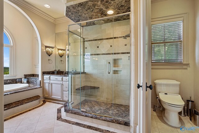 full bathroom with vanity, separate shower and tub, crown molding, and toilet