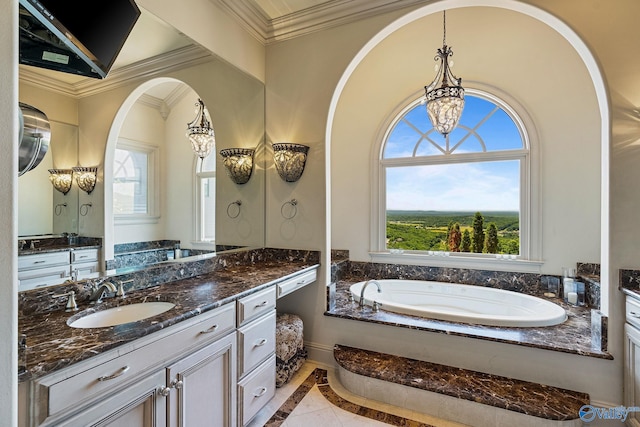 bathroom with vanity, a tub to relax in, crown molding, and an inviting chandelier