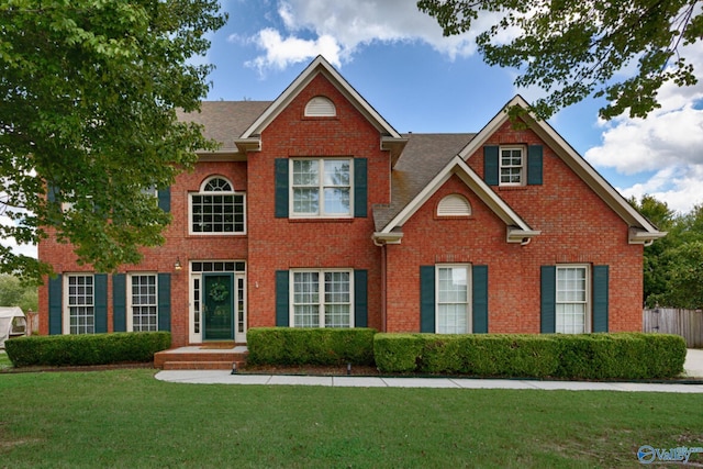 view of front of home with a front yard