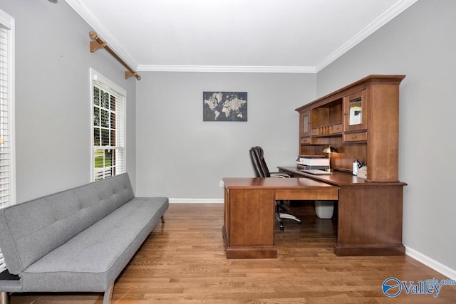 office featuring hardwood / wood-style flooring and ornamental molding