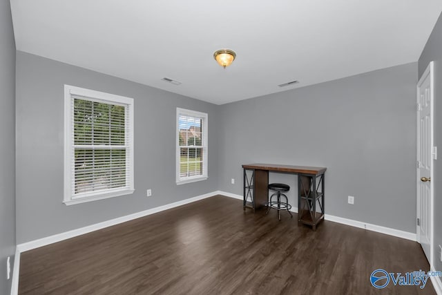 interior space featuring dark wood-type flooring