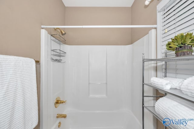 bathroom with shower / bathtub combination