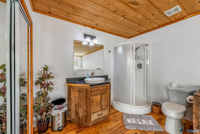 bathroom with wood ceiling, vanity, a shower with door, and hardwood / wood-style flooring