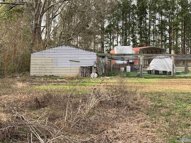 view of yard with a carport