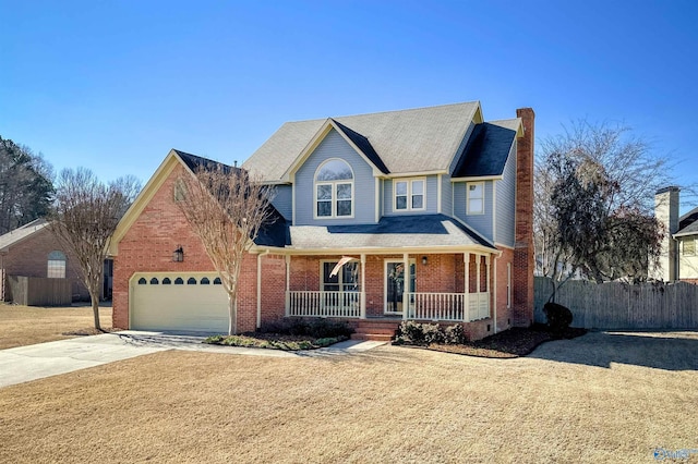 view of front of home with driveway, a porch, fence, and brick siding