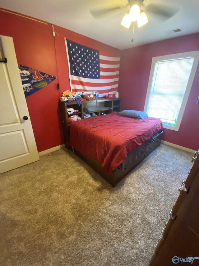 bedroom featuring carpet floors and ceiling fan