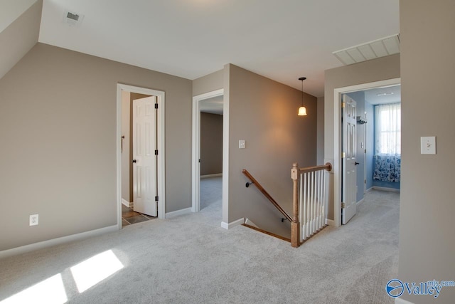 interior space featuring visible vents and baseboards