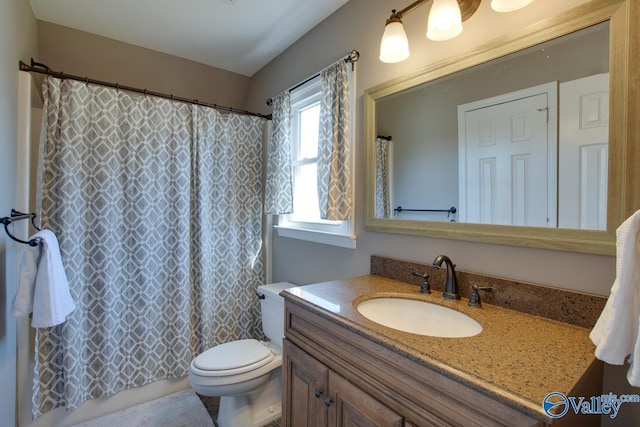 full bath featuring toilet and vanity