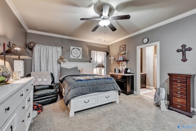 bedroom featuring ornamental molding, light colored carpet, ceiling fan, and visible vents