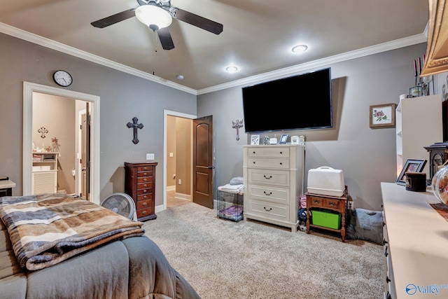 bedroom featuring carpet floors, ornamental molding, and ensuite bath