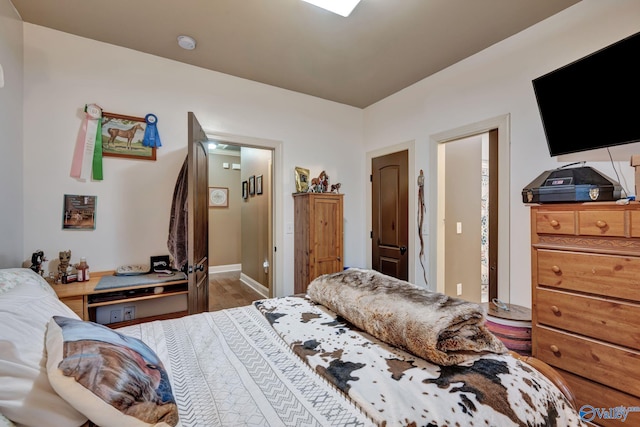 bedroom featuring wood finished floors