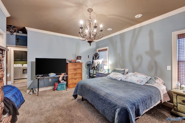 carpeted bedroom with crown molding, multiple windows, washing machine and dryer, and a notable chandelier