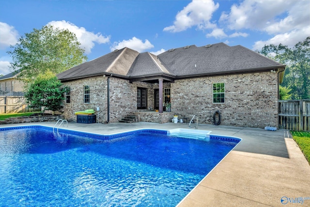 view of pool featuring a patio area, fence, and a fenced in pool