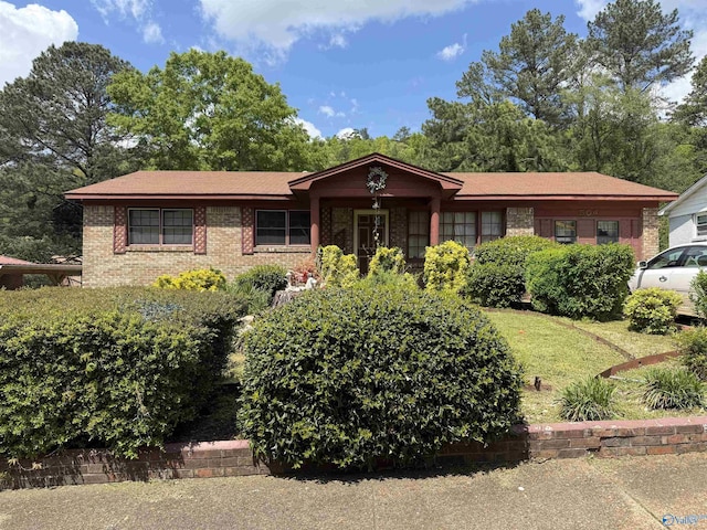 504 Joseph T Robinson, Gadsden, AL 35901 - ranch-style house with brick siding and a front lawn