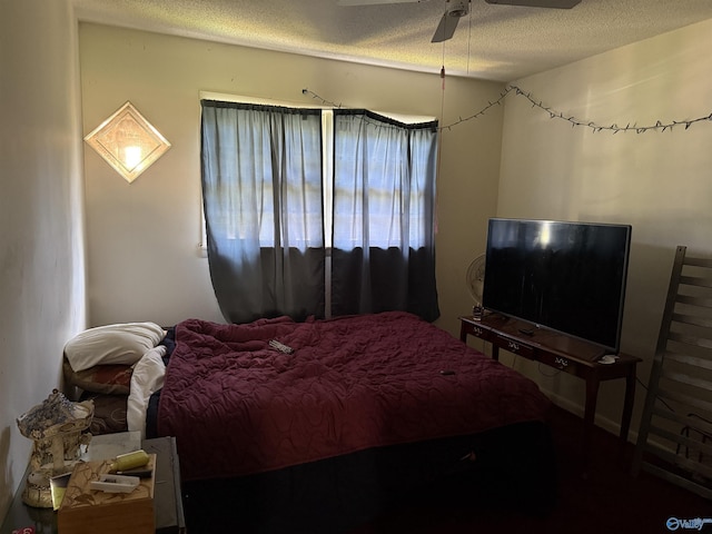 504 Joseph T Robinson, Gadsden, AL 35901 - bedroom with a textured ceiling and a ceiling fan