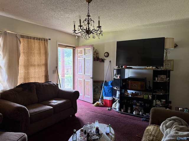 504 Joseph T Robinson, Gadsden, AL 35901 - living room featuring carpet, a notable chandelier, and a textured ceiling