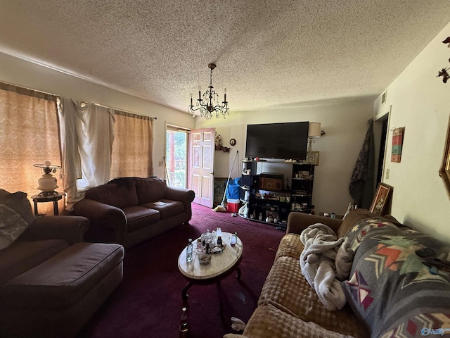 504 Joseph T Robinson, Gadsden, AL 35901 - carpeted living room featuring visible vents, a textured ceiling, and an inviting chandelier