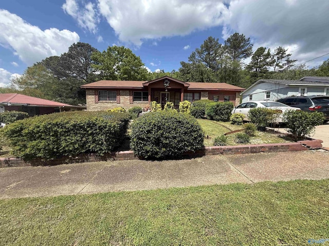504 Joseph T Robinson, Gadsden, AL 35901 - single story home with brick siding and a front lawn
