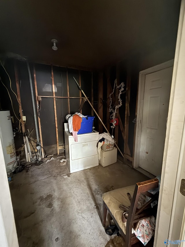 504 Joseph T Robinson, Gadsden, AL 35901 - interior space featuring fridge, gas water heater, and washing machine and dryer