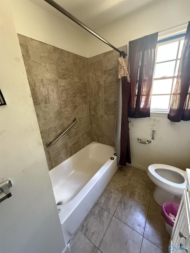 504 Joseph T Robinson, Gadsden, AL 35901 - bathroom with tile patterned floors, shower / tub combo with curtain, and toilet