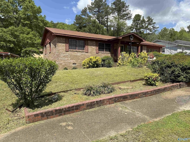 504 Joseph T Robinson, Gadsden, AL 35901 - ranch-style home featuring brick siding, a front lawn, and crawl space