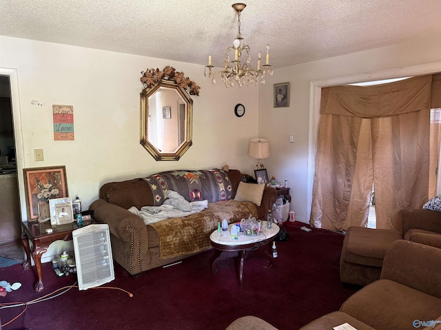 504 Joseph T Robinson, Gadsden, AL 35901 - living area with an inviting chandelier and a textured ceiling