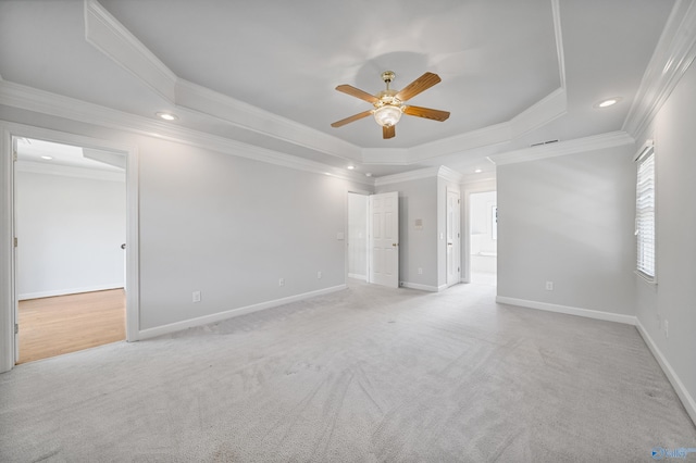 2600 SE Calumet Dr SE, Brownsboro, AL 35741 - empty room with ceiling fan, a raised ceiling, light carpet, recessed lighting, and crown molding