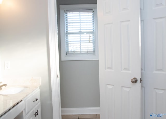 bathroom featuring vanity and tile patterned flooring