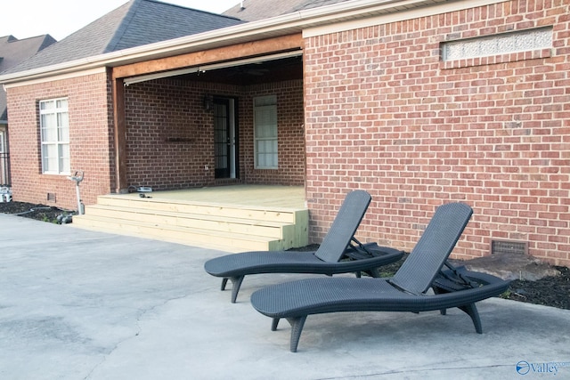 view of patio featuring a deck