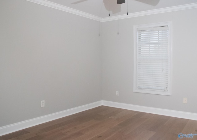 empty room featuring ceiling fan, ornamental molding, and hardwood / wood-style floors