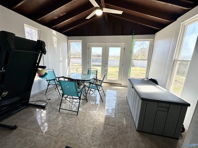 sunroom featuring french doors, ceiling fan, and vaulted ceiling with beams