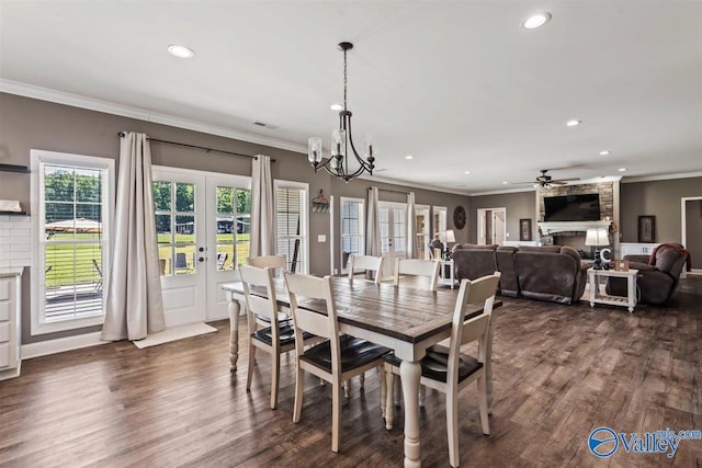 dining space featuring french doors, ornamental molding, dark wood-style floors, and recessed lighting