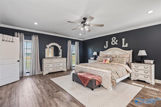 bedroom with recessed lighting, baseboards, visible vents, and wood finished floors