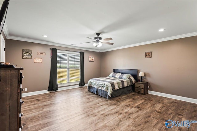 bedroom featuring recessed lighting, baseboards, ornamental molding, and wood finished floors