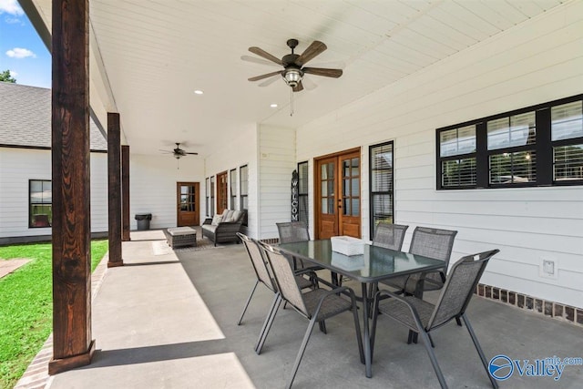view of patio / terrace featuring a ceiling fan, french doors, outdoor dining area, and an outdoor hangout area