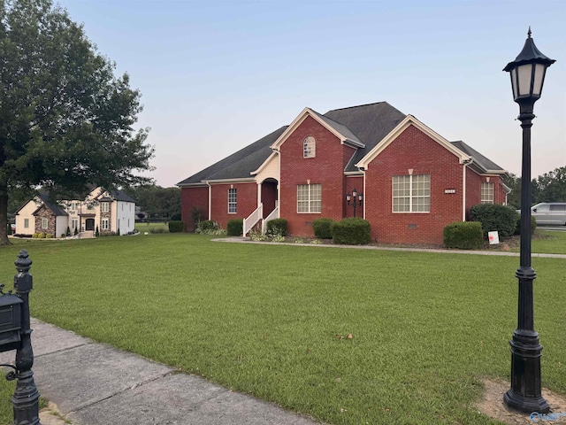 2032 Red Oak Ln NE, Arab, AL 35016 - view of front of property with brick siding and a yard