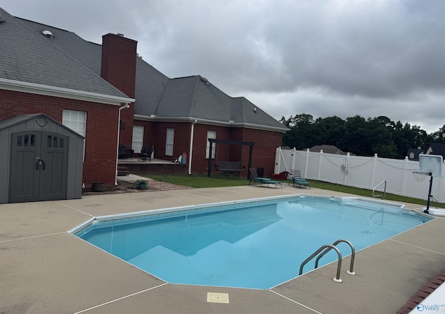 2032 Red Oak Ln NE, Arab, AL 35016 - view of pool with a patio and a shed