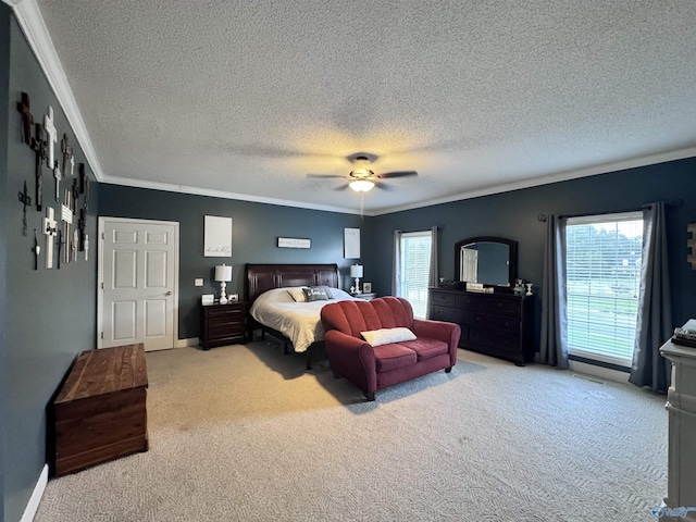 2032 Red Oak Ln NE, Arab, AL 35016 - carpeted bedroom featuring crown molding, a textured ceiling, multiple windows, and a ceiling fan