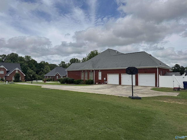 2032 Red Oak Ln NE, Arab, AL 35016 - view of side of property featuring concrete driveway, brick siding, and a garage