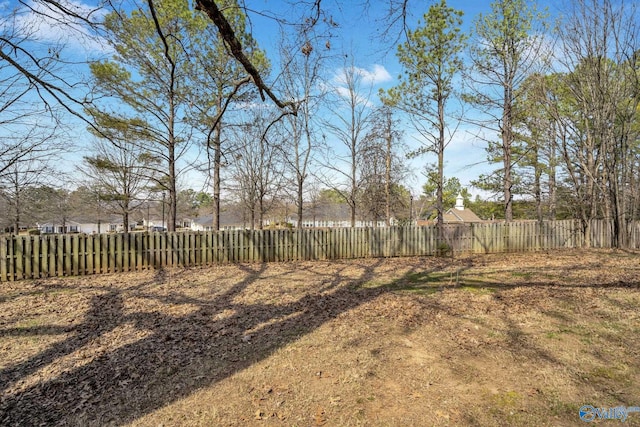 view of yard featuring fence private yard