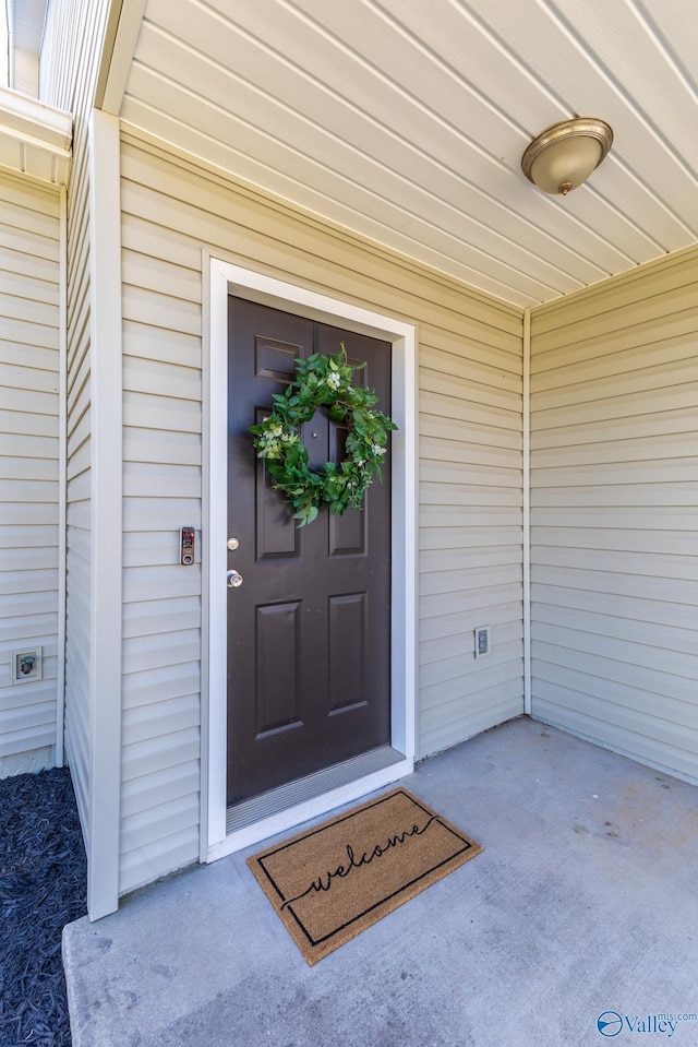 view of exterior entry with crawl space